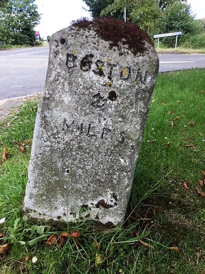Stone milestone marker at Wortley's lane Boston