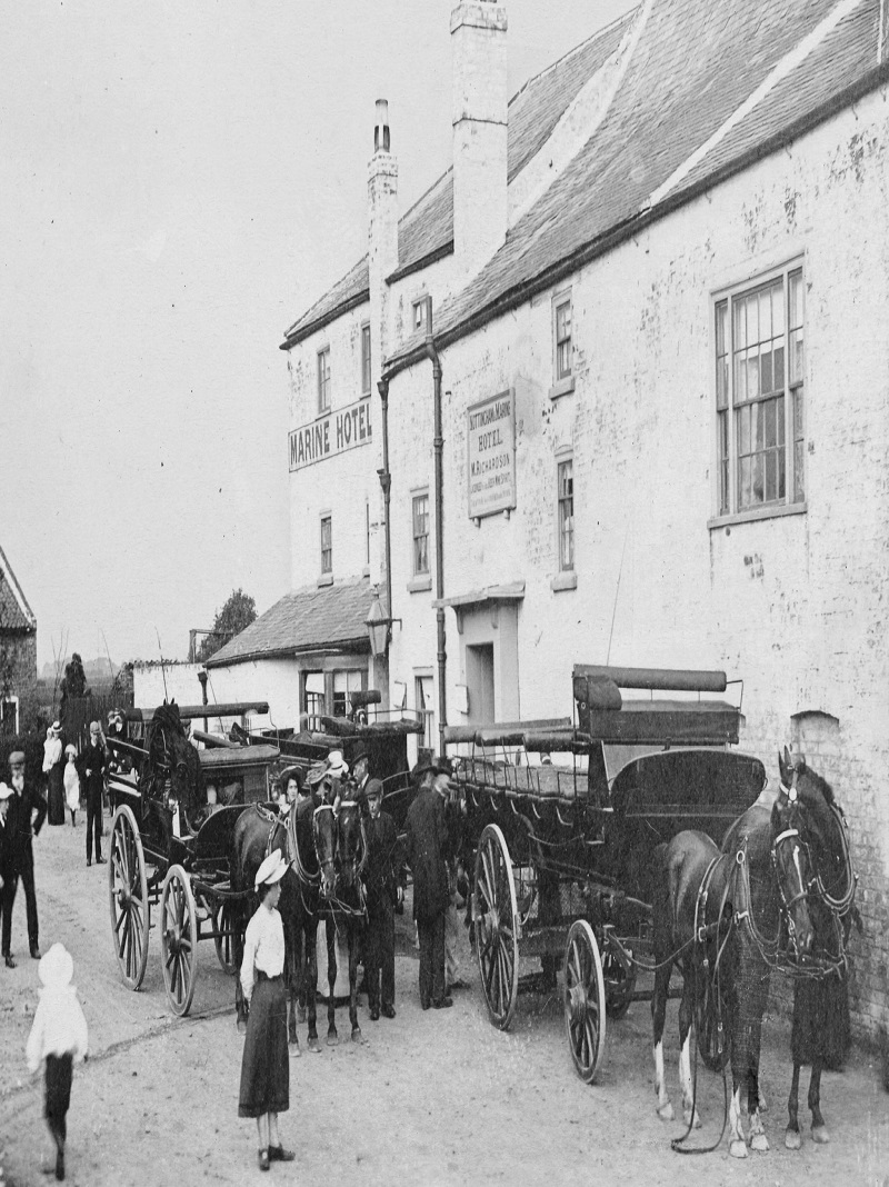 Image of Frieston shore in 1900. taken outside the Marine Hotel, with horse and carrages