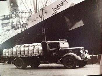 Johnsons seeds on a truck in front of the Queen Mary Ship
