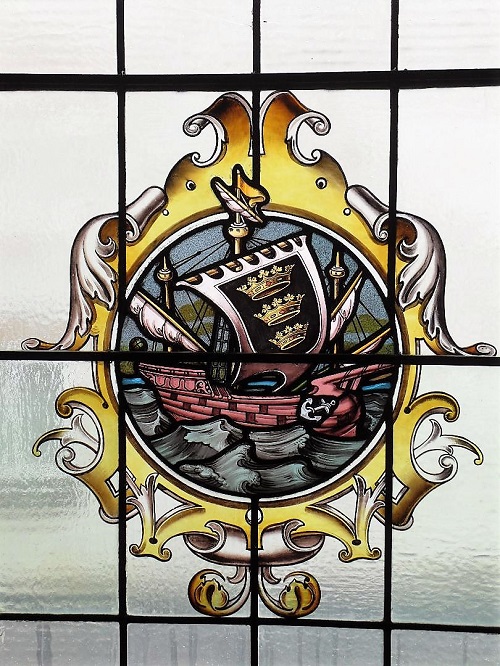 an image of a ship on a stained glass window at the Boston council